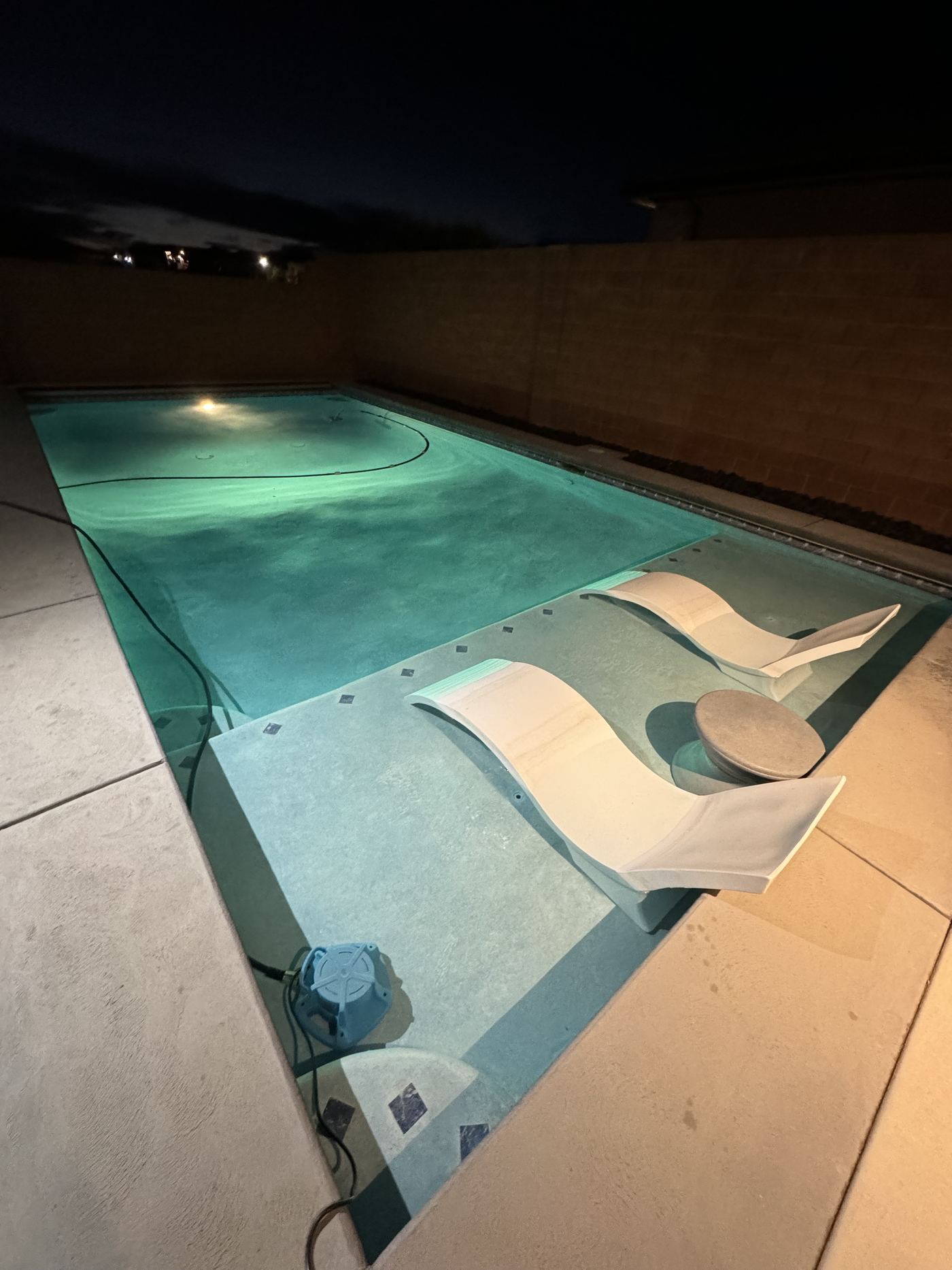 Clean lit swimming pool at night in St. George