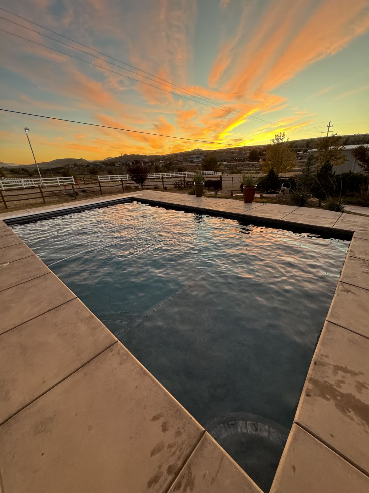 Sunset over a clean pool edge in Washington County, Utah